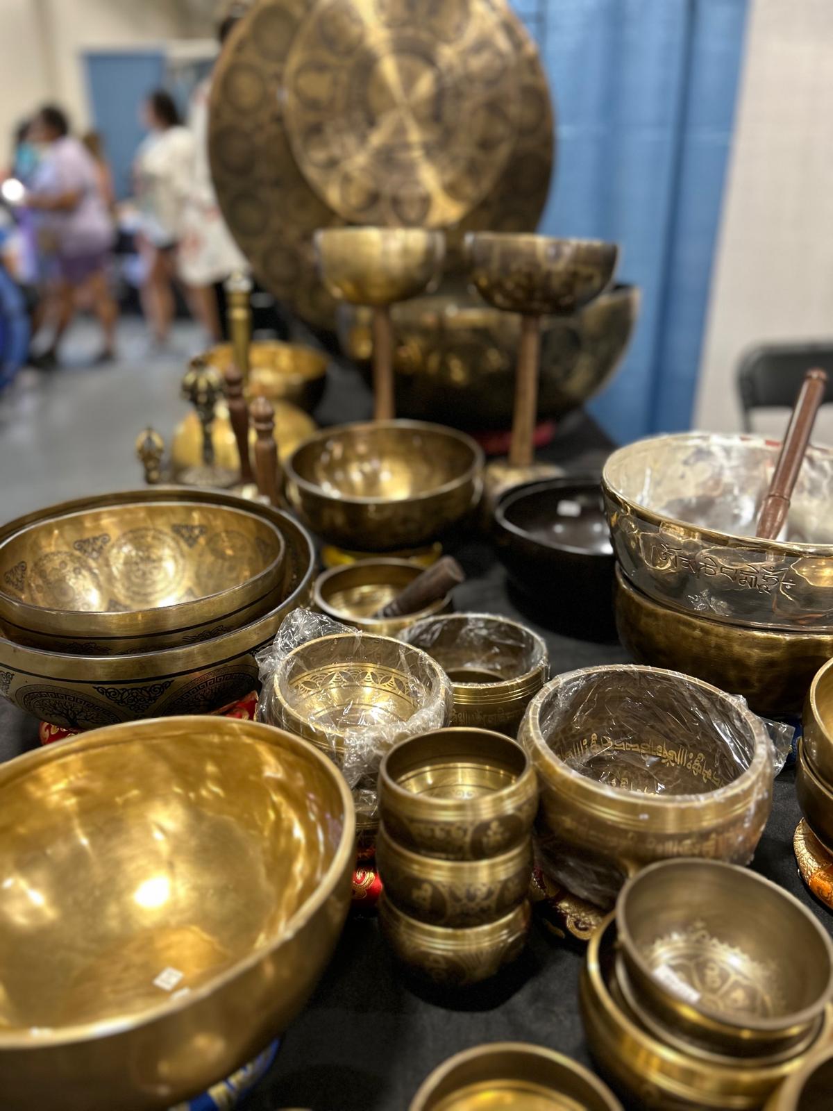 Extensive collection of golden Tibetan singing bowls for comprehensive sound healing therapy
